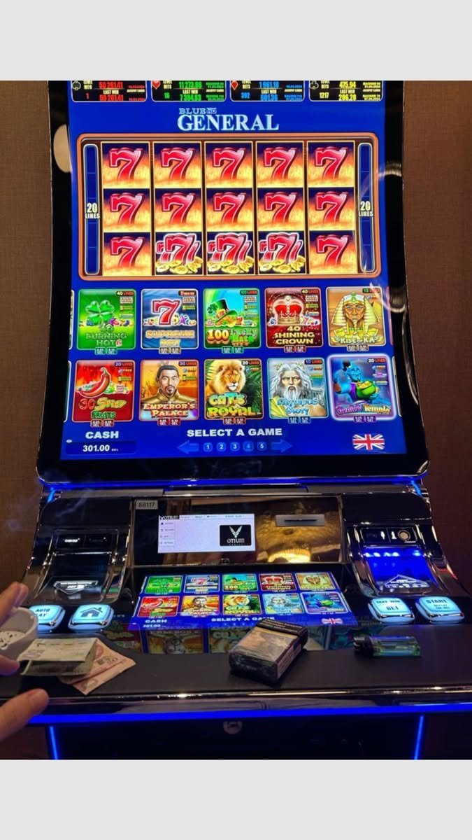 When the lights flickered on the old slot machine in the back of a pub, I